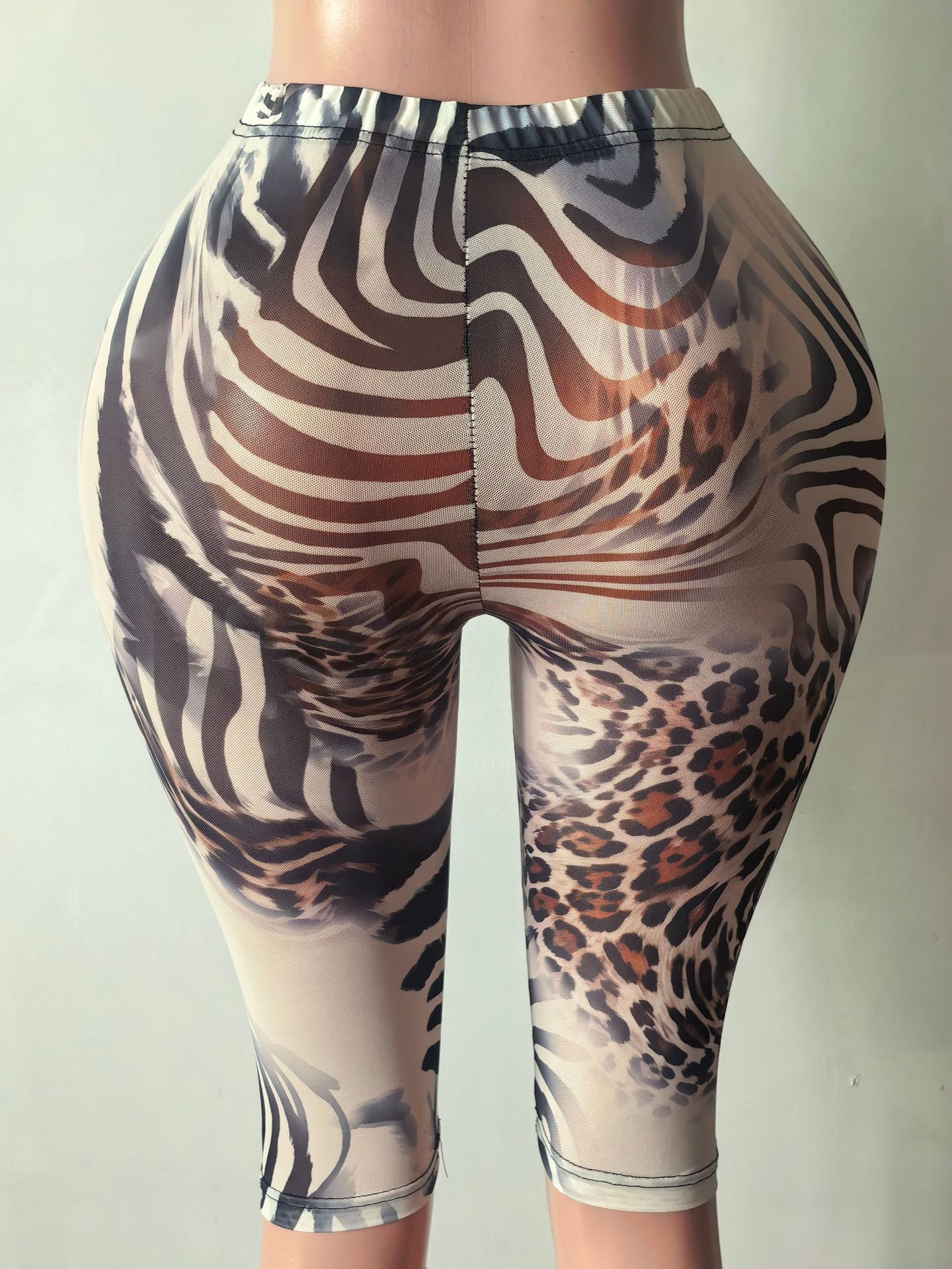 กางเกงคาปรีผ้าตาข่ายลายผสมเสือ - Zebra Tablet Accessories บทวิจารณ์และราคา